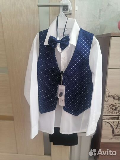 Школьный костюм для мальчика новый 128