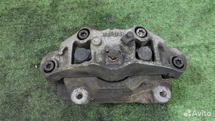 Суппорт тормозной передний левый Jaguar XF 2009