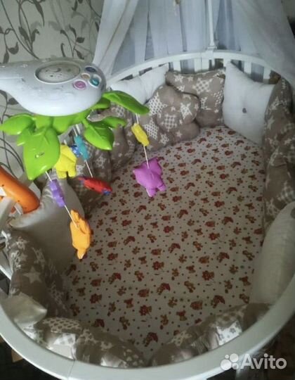 Детская кроватка трансформер с маятником