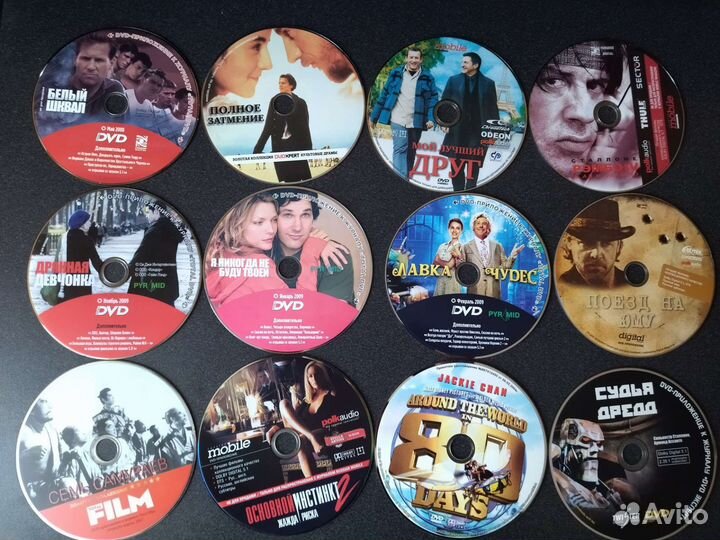 Фильмы на DVD дисках и мультики 74шт
