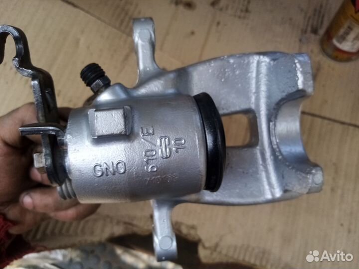 Суппорт тормозной задний volksvagen shkoda