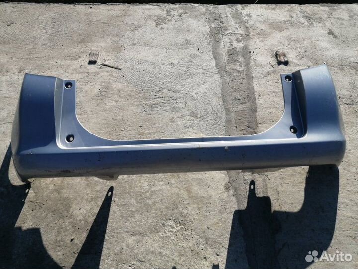 Бампер задний Toyota Ractis NCP100