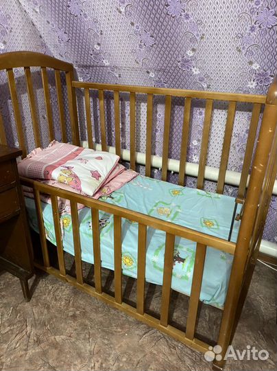 Детская кроватка трансформер с маятником