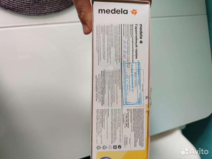 Молокоотсос medela электрический