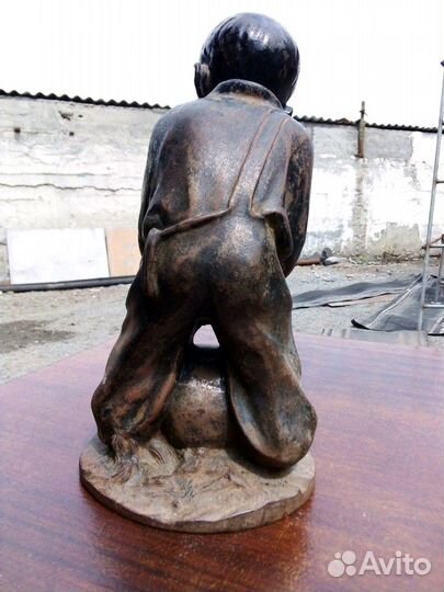 Мальчик с гирей