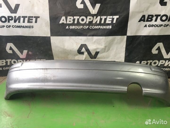 Бампер задний Nissan March K11