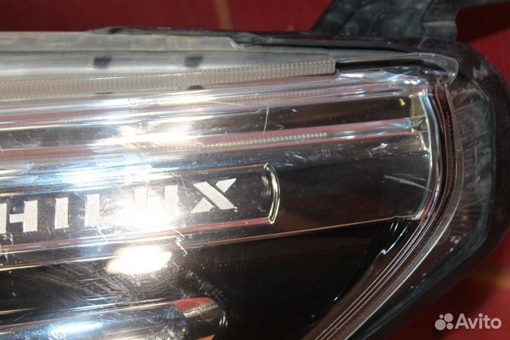 Фара левая Toyota Hilux Pick Up