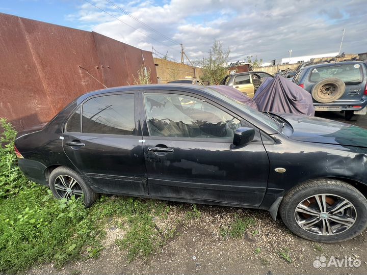 Двери Mitsubishi Lancer 9