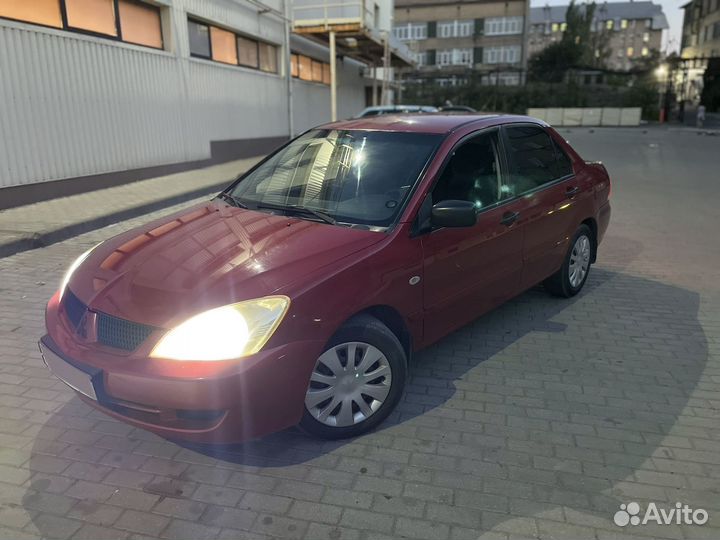 Mitsubishi Lancer 1.3 МТ, 2006, 180 000 км