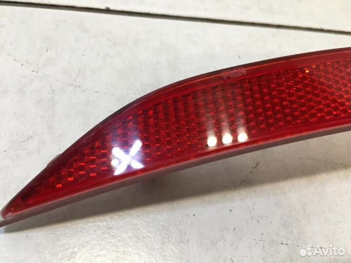 Отражатель в бампер задний левый Volkswagen Passat