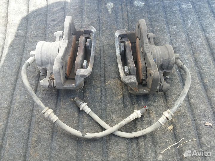 Суппорта передние шевроле лачетти