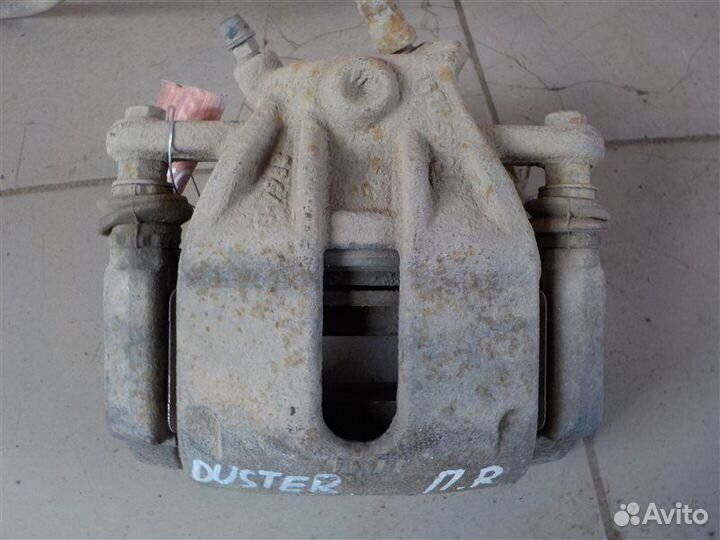 Суппорт тормозной передний правый Renault Duster