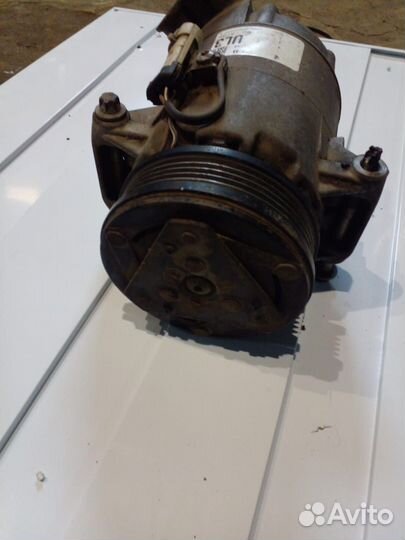 Опель Астра компрессор кондиционера