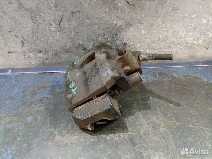 Суппорт передний Mazda Tribute EP