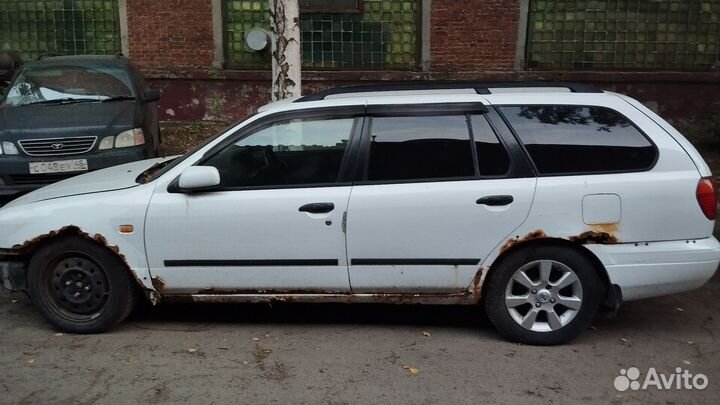 Разбираем прямо сейчас Nissan Primera P11