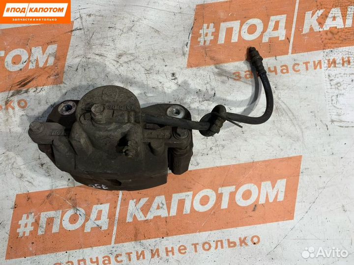 Суппорт тормозной передний правый Toyota Camry