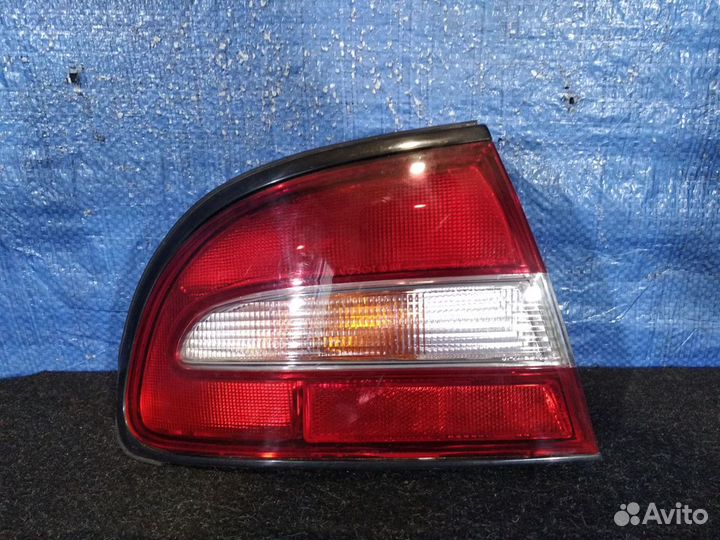 Фонарь левый Mitsubishi Galant