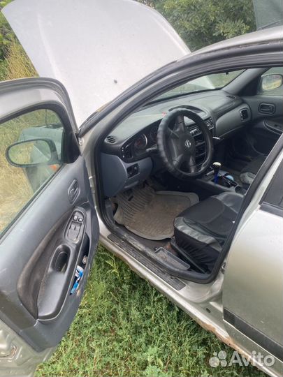 Nissan almera n16 разбор
