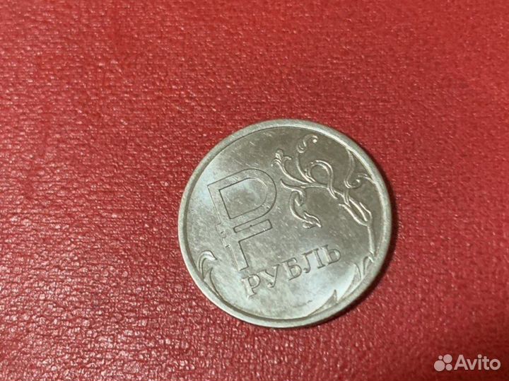 Манета без наминала. С буквой