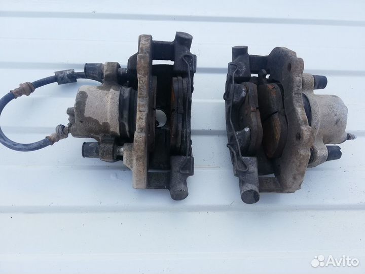 Передние тормозные суппорта Мазда 3 бк