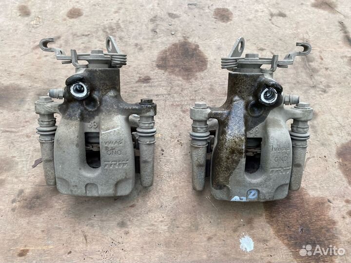 Суппорт тормозной задний Skoda Octavia A7