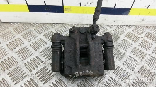 Суппорт тормозной задний правый toyota corolla E12