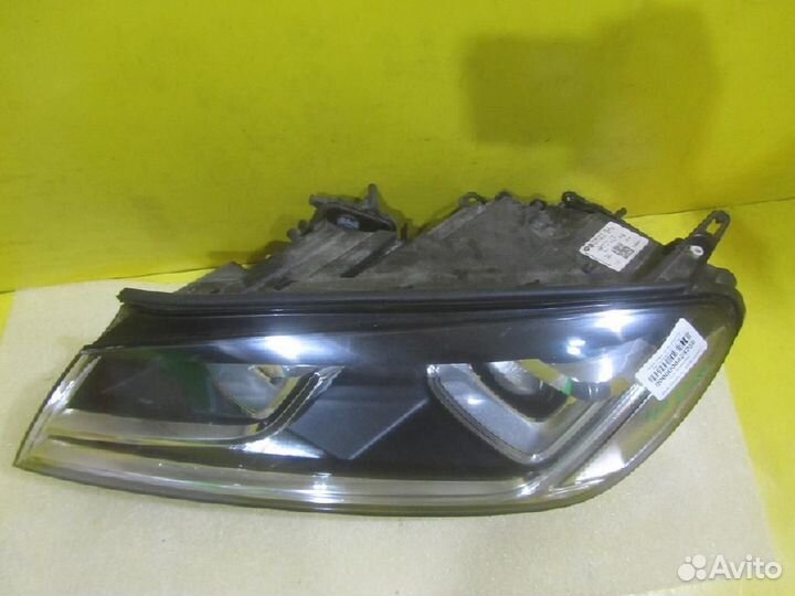 Фара левая Volkswagen Touareg