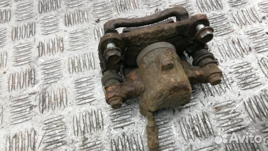 Суппорт тормозной задний правый toyota corolla E12