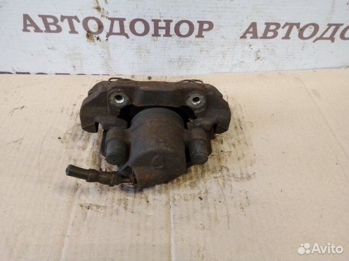 Суппорт тормозной передний правый Ford Fiesta 1.4D