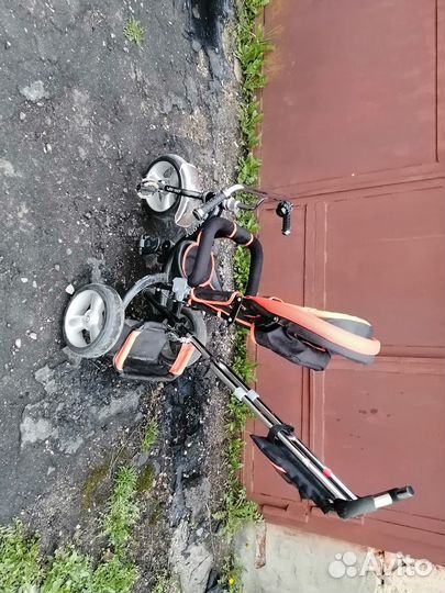 Детский трехколесный велосипед с ручкой