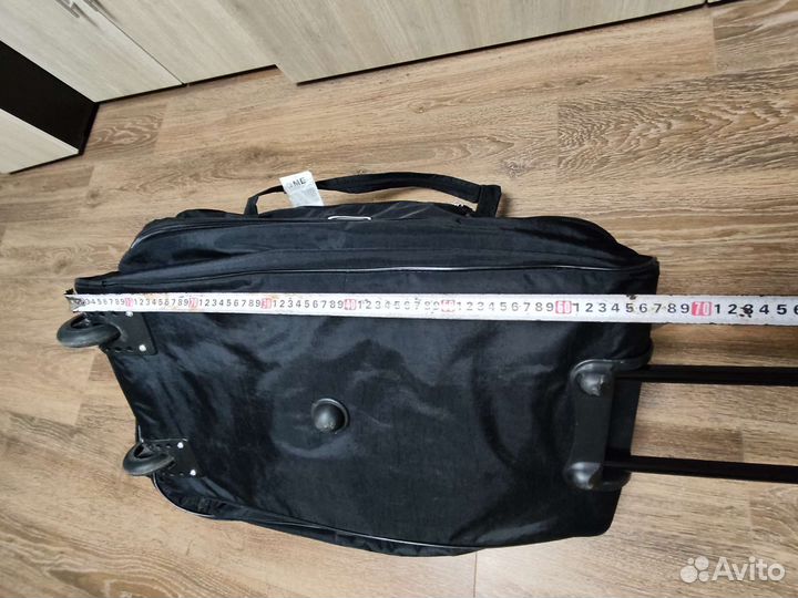 Сумка дорожная на колесах с выдвижной ручкой