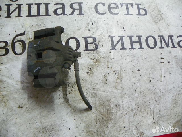 Суппорт тормозной задний Kia Sorento 2002-2009