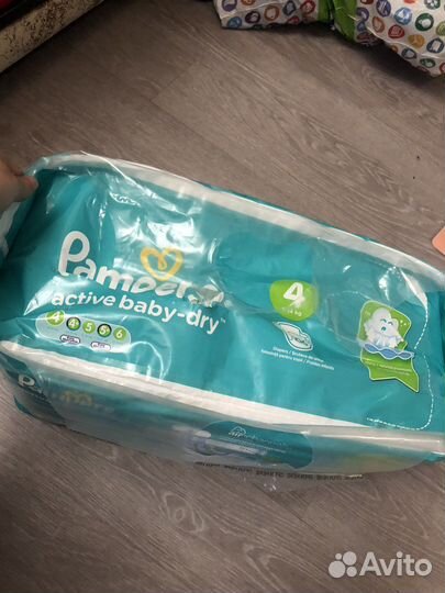 Памперсы детские 4