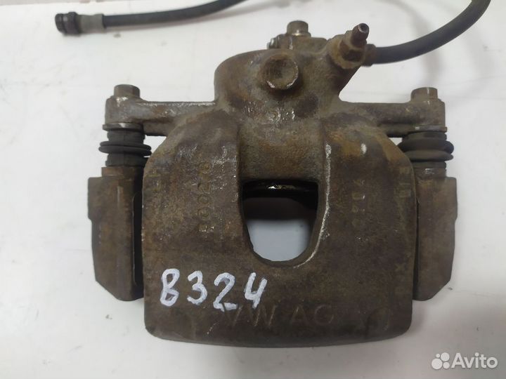 Суппорт тормозной передний левый Rapid 2013-2020