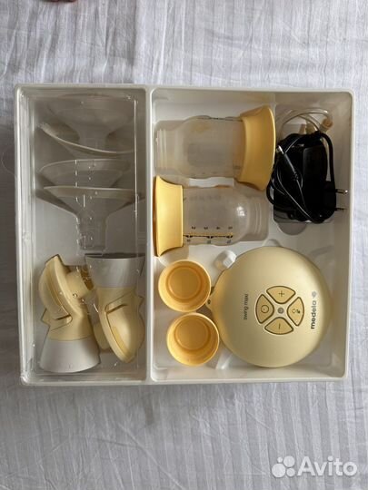 Молокоотсос medela swing maxi