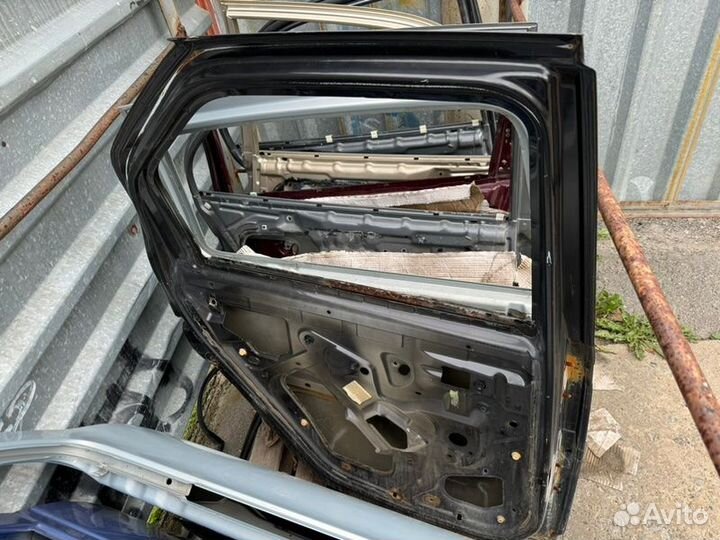 Дверь боковая задняя левая Renault Logan K7jа 710