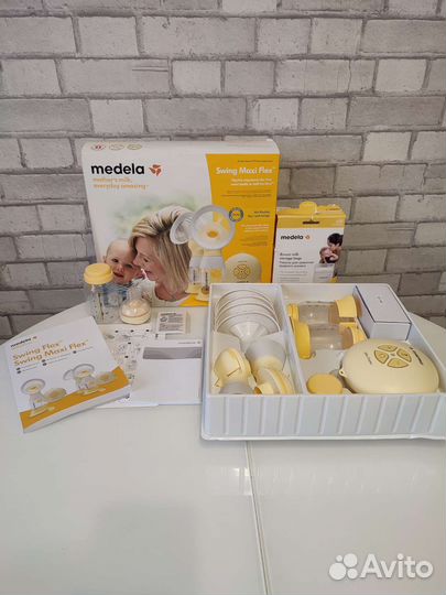 Молокоотсос medela swing maxi flex