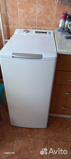 Стиральная машина с вертикальной загрузкой