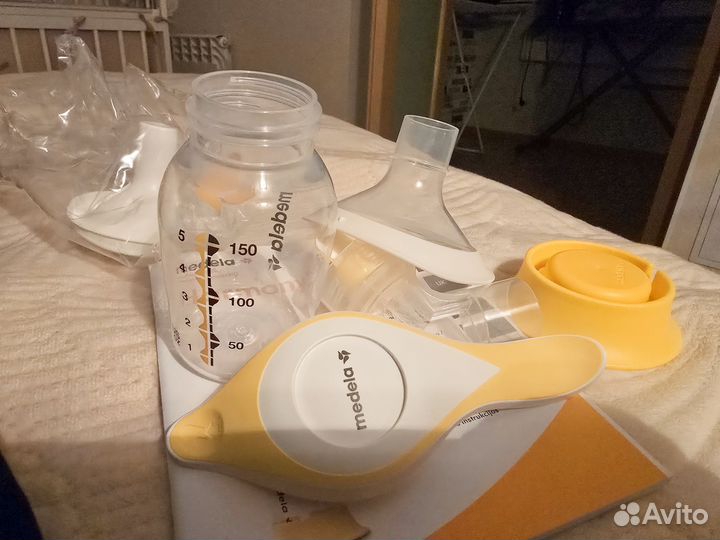Новый ручной молокоотсос medela