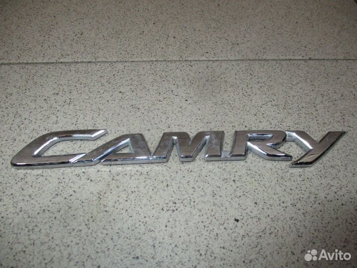 Эмблема Toyota Camry XV50 2011-2017