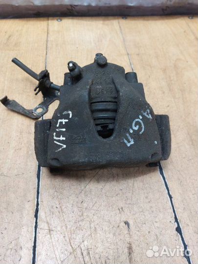 Тормозной суппорт передний правый Opel Astra H