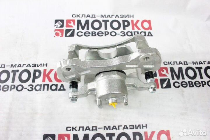 Суппорт тормозной передний правый Mitsubishi L200