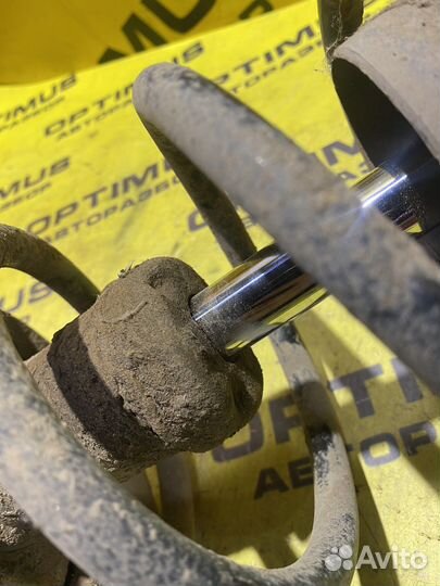 Передняя левая стойка Opel Astra G