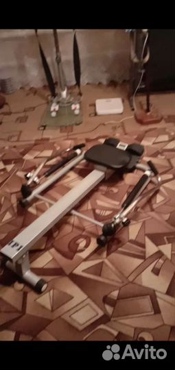 Гребной тренажер