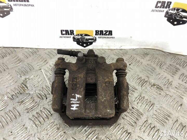 Суппорт задний левый L Nissan X-Trail