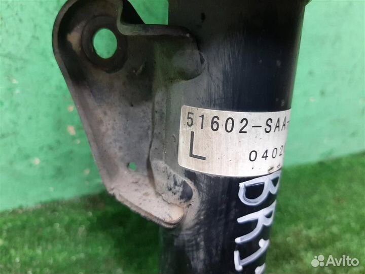 Стойка амортизатора передняя левая Honda Jazz 2004