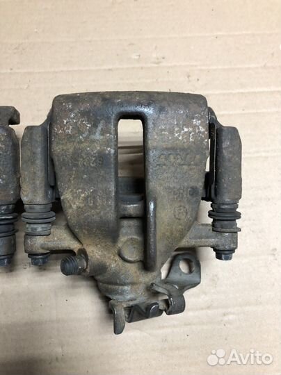 Суппорт задний левый ; правый Фольксваген Т5