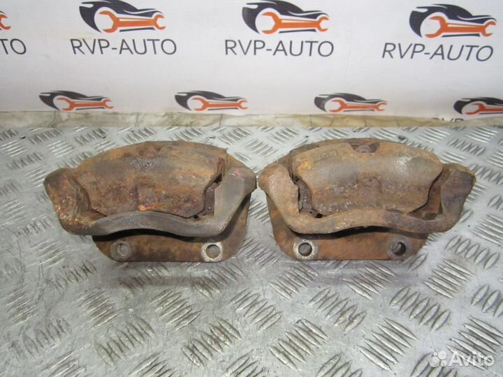 Суппорт тормозной передний Renault Logan 2005-2014