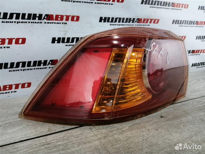 Фонарь левый Митсубиси Лансер 10