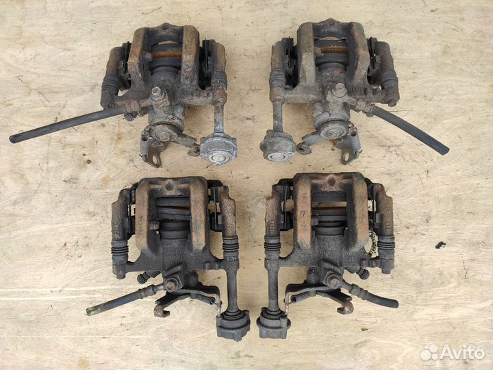 Суппорт задний на Опель Astra J